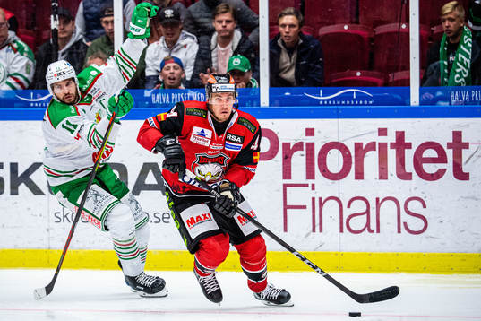Rögles Mattias Sjögren och Malmö Redhawks Jesper Jensen