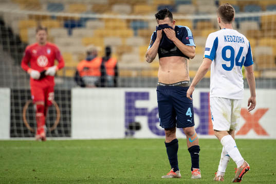 Behrang Safari of Malmö FF looks dejected