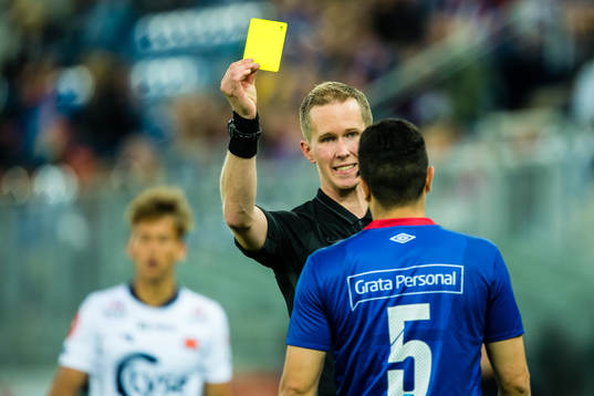 Kristoffer Hagenes, referee, gives Efrain Juarez Valdez of