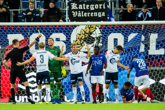 Kristoffer Lie Løkberg of Viking gets a yellow card by