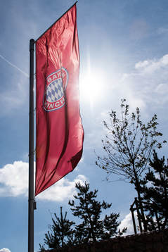 Flags outside the Campus of Bayern Munich