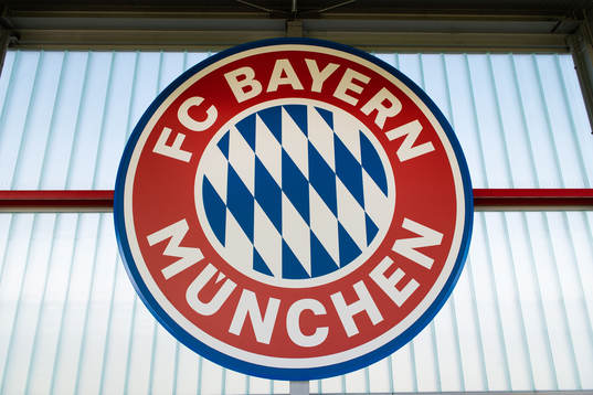 View of a club logo sign at the Bayern Munich Campus Arena