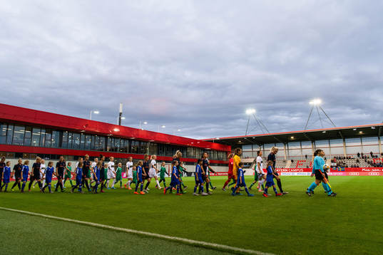Players of Bayern Munich and of Göteborg enter the pitch