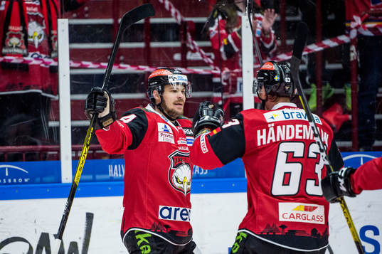 Malmö Redhawks Emil Molin och Fredrik Händemark jublar