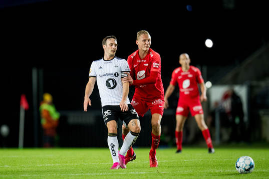 Mike Jensen of Rosenborg and Kristoffer Barmen of Brann