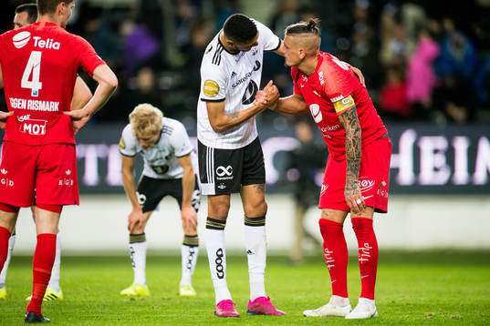 Bjørn Maars Johnsen of Rosenborg and Vito Wormgoor of Brann