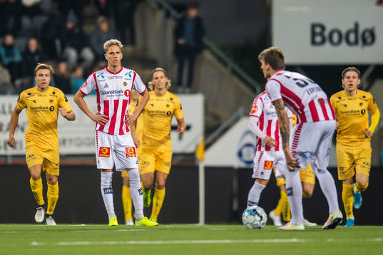 Eric Smith and Runar Espejord of Tromsø look dejected