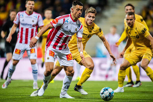 Fitim Azemi of Tromsø and Fredrik André Bjørkan of