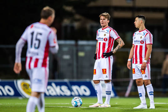 Runar Espejord and Fitim Azemi of Tromsø look dejected