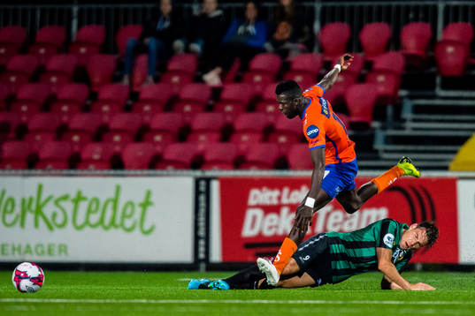 Pape Habib Gueye of Aalesund and Ole Kristian Langås of