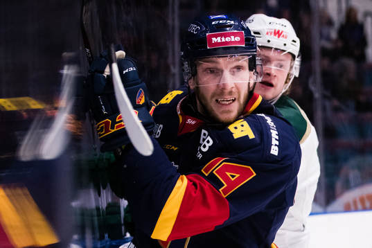 Djurgårdens Tom Wandell och Färjestads Linus Arnesson