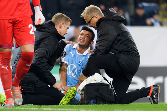 Behrang Safari of Malmö FF gets medical attention