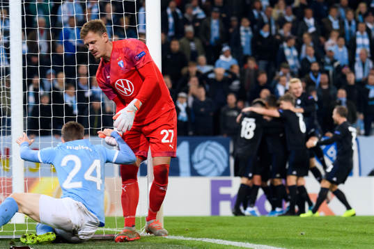 Lasse Nielsen gets help from goalkeeper Johan Dahlin