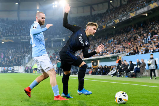 Jo Inge Berget of Malmö FF and Guillermo Varela of FC