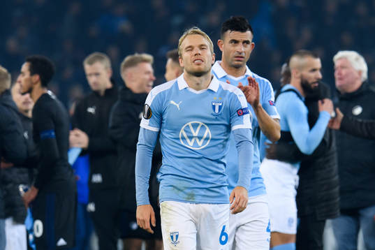 Oscar Lewicki and Behrang Safari of Malmö FF looks dejected
