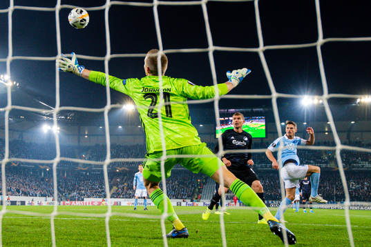 Markus Rosenberg of Malmö FF scores 1-1 behind Karl-Johan