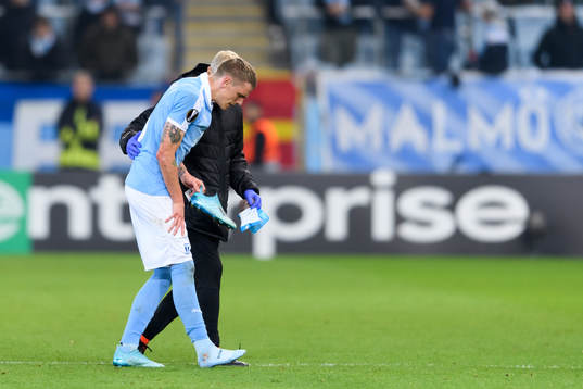Sören Rieks of Malmö FF receives medical attention