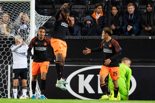 Denzel Dumfries of PSV Eindhoven celebrates scoring 0-2