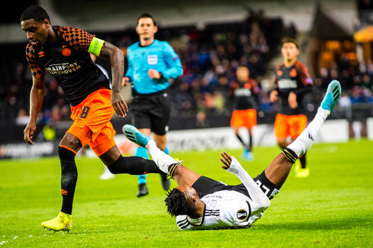 Pablo Rosario of PSV Eindhoven and Samuel Adeniyi Adegbenro
