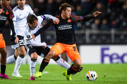 Mike Jensen of Rosenborg and Ritsu Doan of PSV Eindhoven