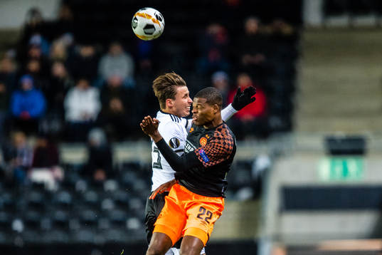 Anders Trondsen of Rosenborg and Denzel Dumfries of PSV