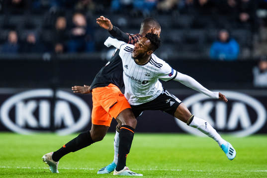 Denzel Dumfries of PSV Eindhoven and Samuel Adegbenro of