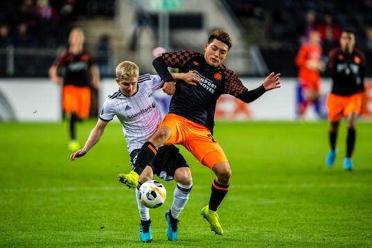 Edvard Tagseth of Rosenborg and Ritsu Doan of PSV Eindhoven