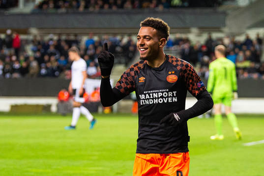 Donyell Malen of PSV Eindhoven celebrates scoring 1-4