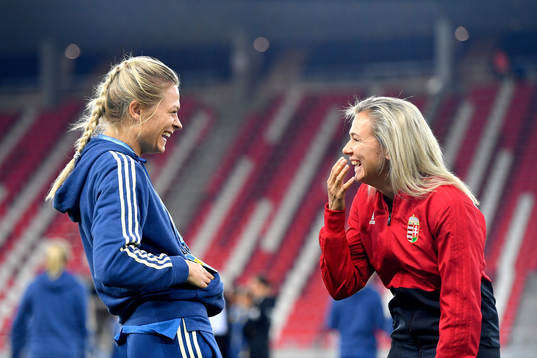 Fridolina Rolfo of Sweden jokes with a Hungarian player