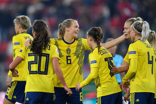 Magdalena Ericsson and Fridolina Rolfo of Sweden celebrate