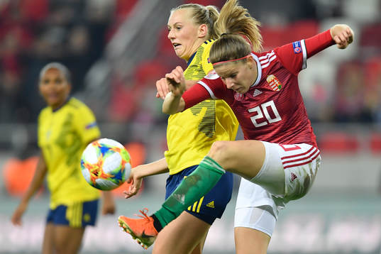 Stina Blackstenius of Sweden vies against Lilla Turanyi of