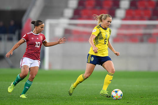 Magdalena Ericsson of Sweden vies against Fanni Vago of