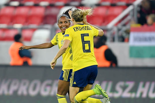 Madelen Janogy and Magdalena Ericsson of Sweden celebrate