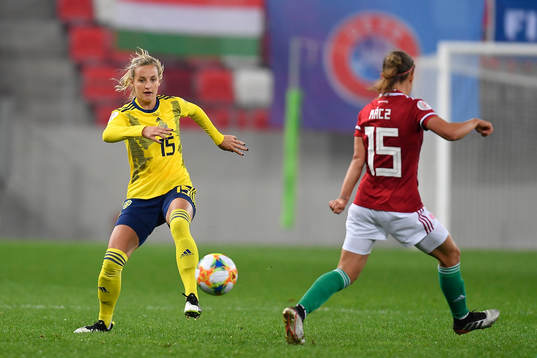 Nathalie Bjorn of Sweden vies against Zsofia Racz of Hungary