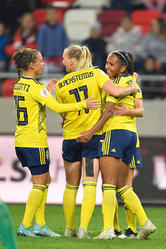 Mia Carlsson and Stina Blackstenius celebrate with Madelen