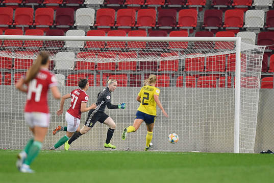 Hedvig Lindahl of Sweden vies against Bernadett Zagor of