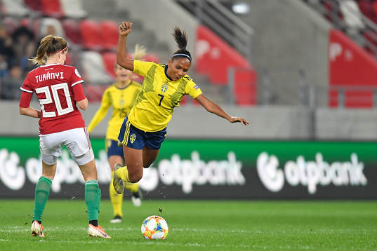 Madelen Janogy of Sweden vies against Lilla Turanyi of
