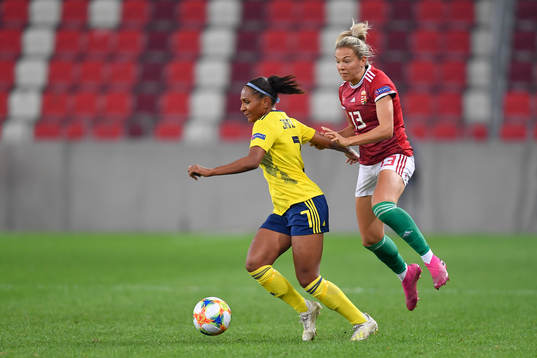 Madelen Janogy of Sweden vies against Fanni Vago of Hungary