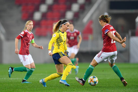Kosovare Asllani of Sweden vies against Nathalie Bjorn of