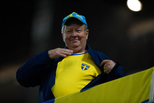 Sweden's supporter reacts