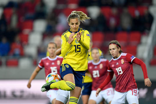 Nathalie Björn of Sweden vies against Dora Zeller of