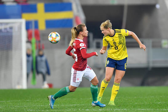 Magdalena Ericsson of Sweden vies against Diana Csanyi of