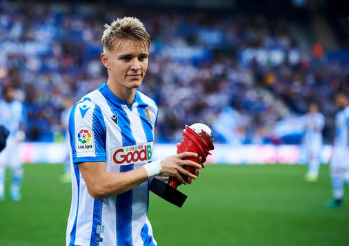 Xavi Prieto gives Martin Odegaard of Real Sociedad the