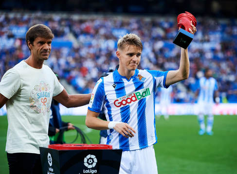 Xavi Prieto gives Martin Odegaard of Real Sociedad the