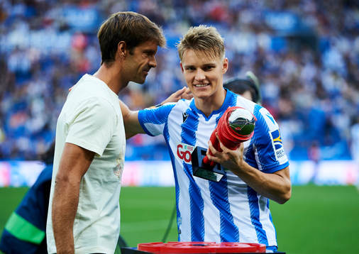 Xavi Prieto gives Martin Odegaard of Real Sociedad the