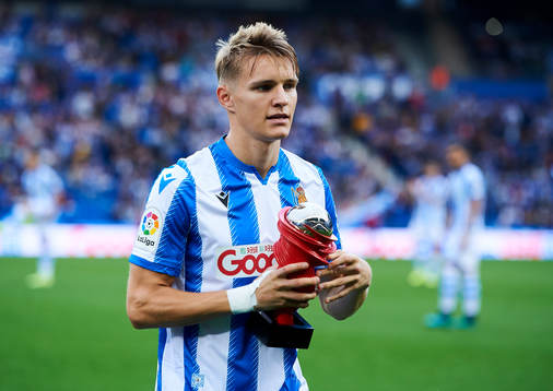 Xavi Prieto gives Martin Odegaard of Real Sociedad the