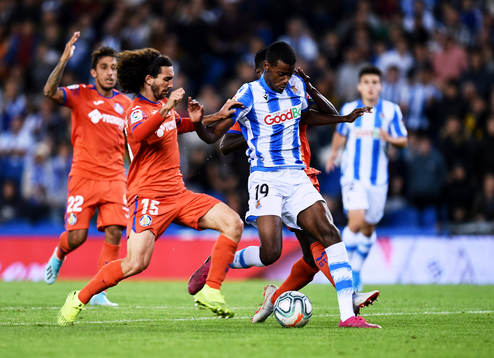 Alexander Isak of Real Sociedad battles for the ball with