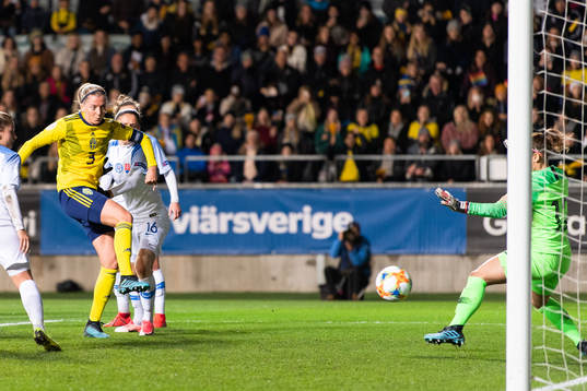 Linda Sembrant of Sweden scores 3-0 behind goalkeeper Maria