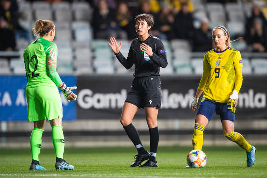 Goalkeeper Maria Korenciova reacts against referee Elvira