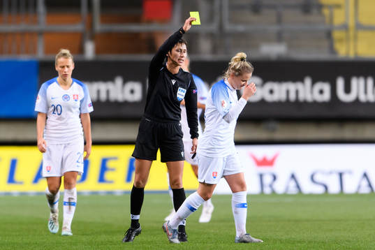 Dominika Skorvankova of Slovakia is shown a yellow card